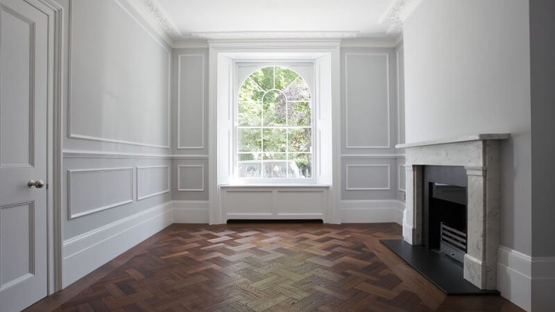 Harmonizing Home Interiors: Befriending Laminate Flooring with Shadow Skirting Boards with Interior Designers London